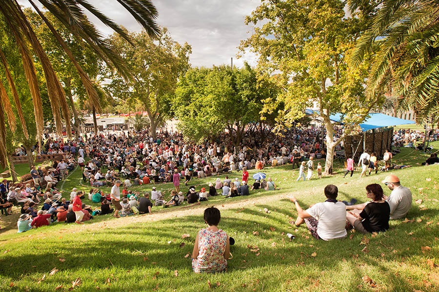 People at Writers' Week sitting in Elder Park