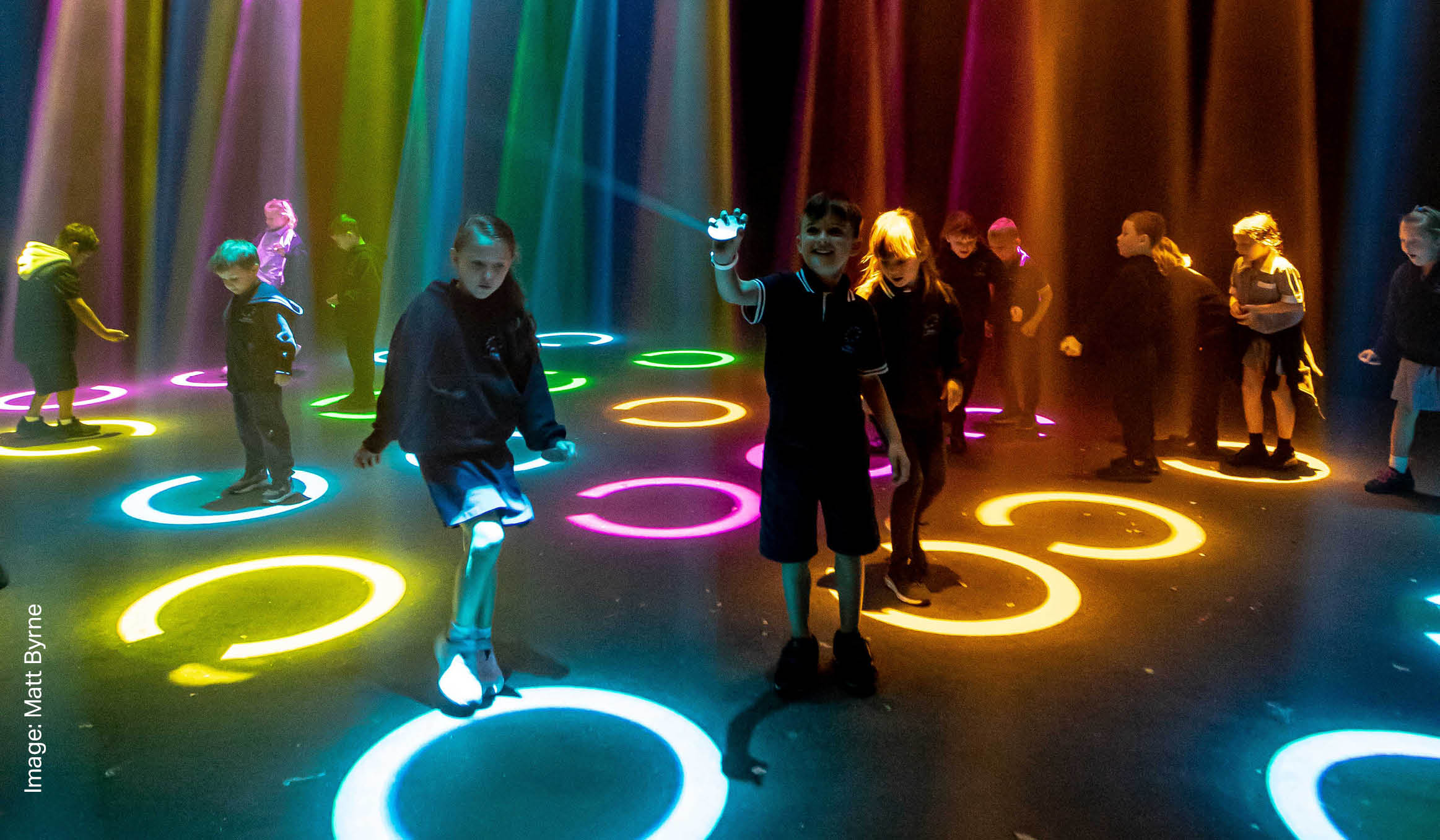 Children excited among laser lights