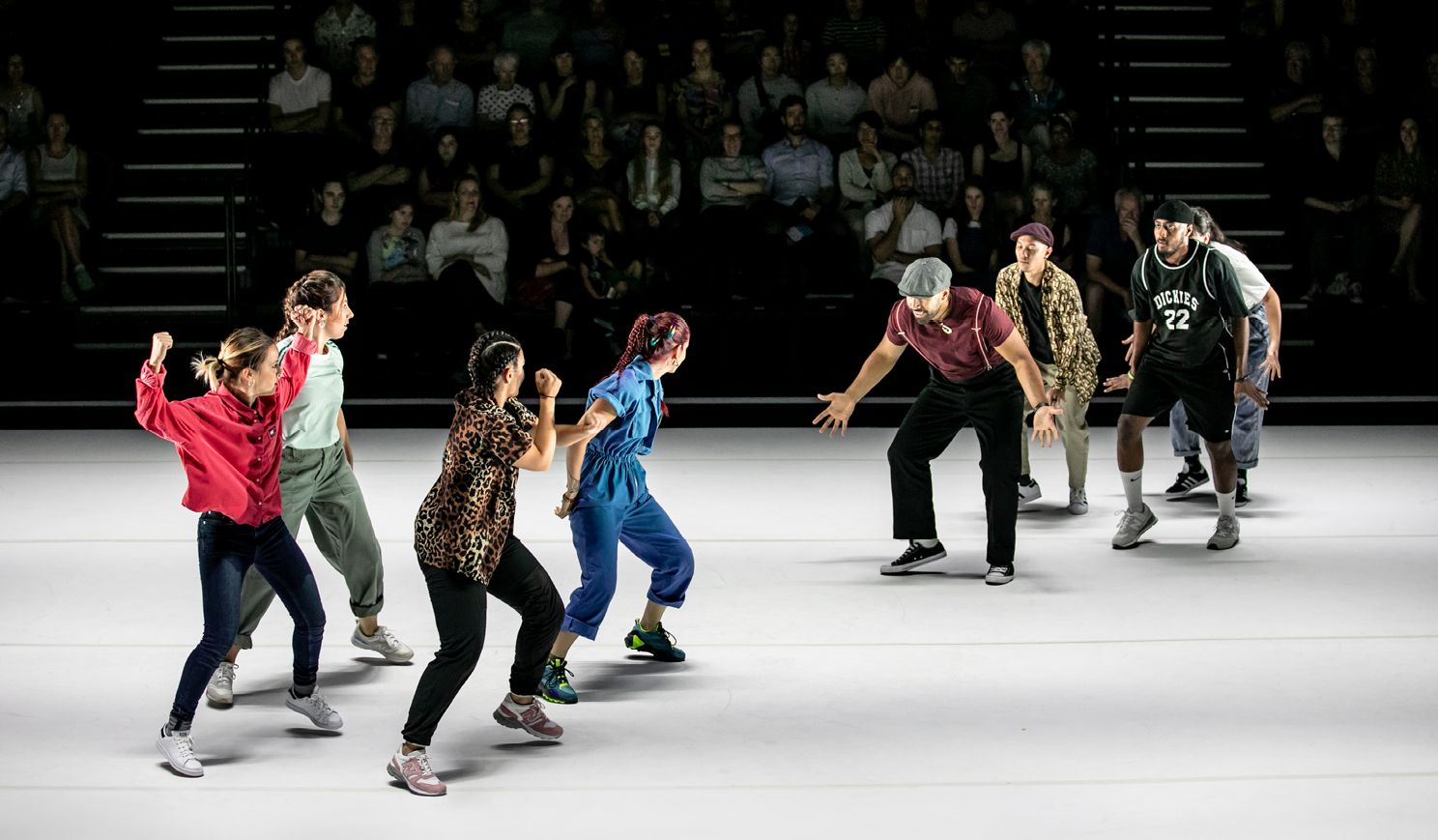 Dancers opposite one another in a dance off