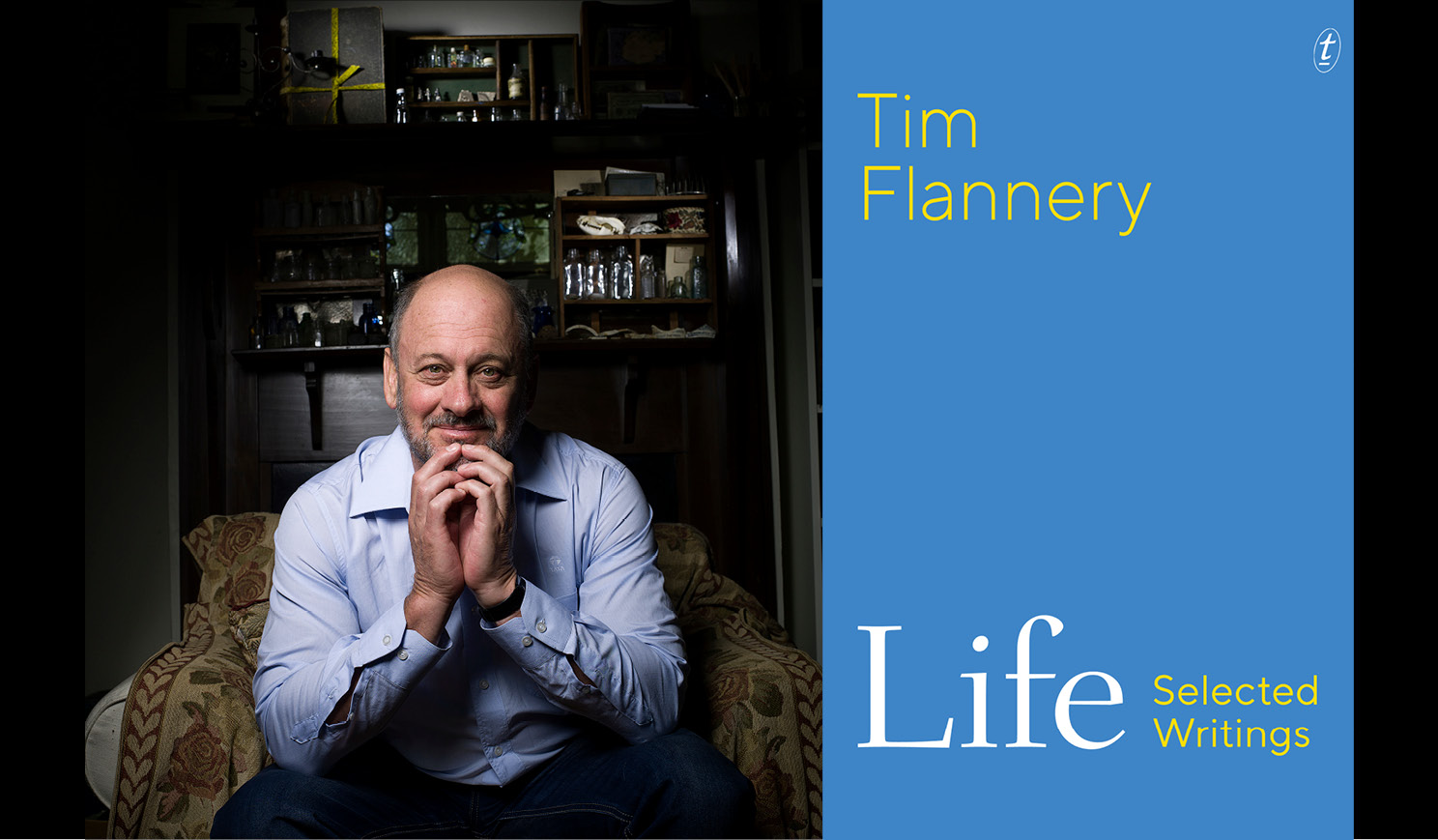 Tim Flannery alongside the cover of his book Life